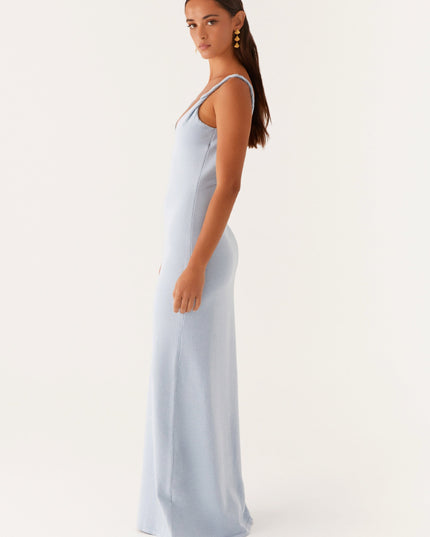 Woman wearing soft blue maxi dress