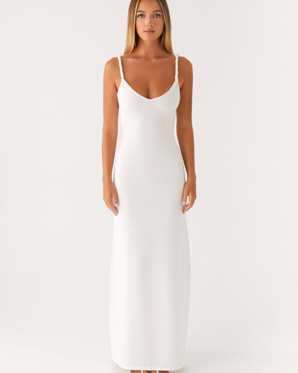 Woman wearing soft blue maxi dress