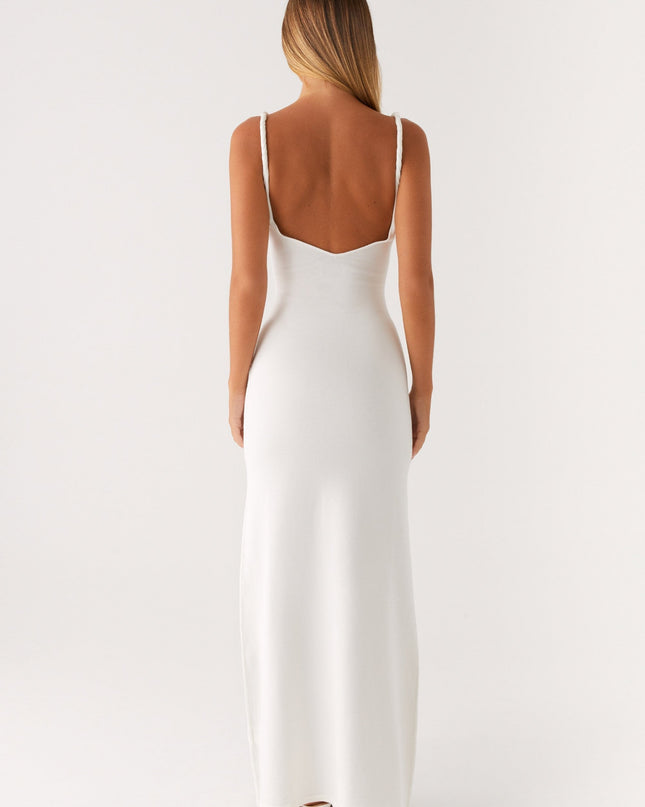 Woman wearing soft blue maxi dress