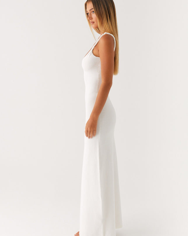 Woman wearing soft blue maxi dress