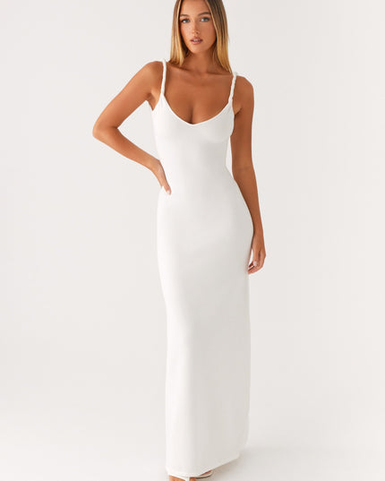 Woman wearing soft blue maxi dress