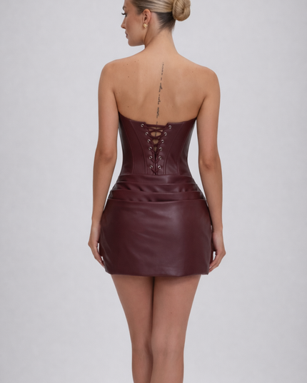 Woman wearing luxe corset mini dress