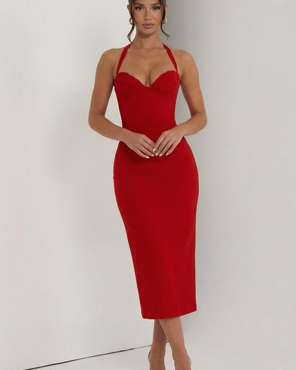 Woman wearing elegant halter midi dress