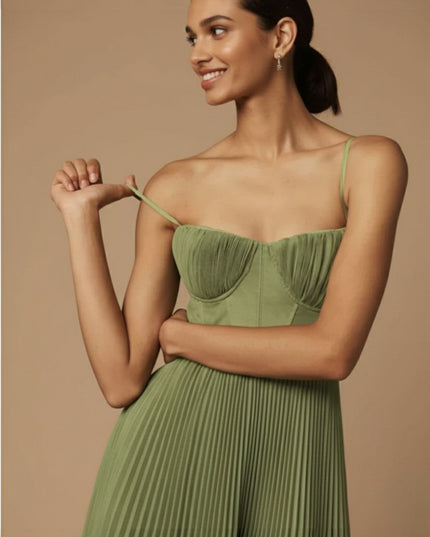 Woman wearing pleated midi dress