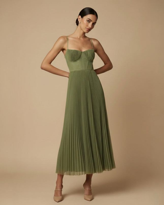 Woman wearing pleated midi dress