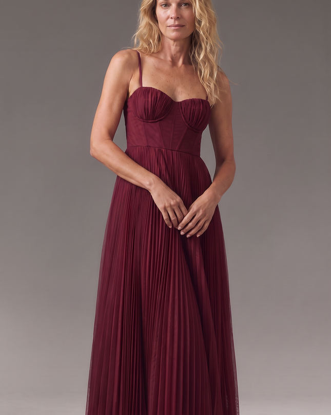 Woman wearing pleated midi dress