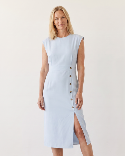 Woman wearing elegant midi office dress