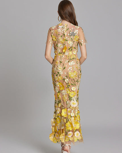 Woman wearing floral embroidered midi dress