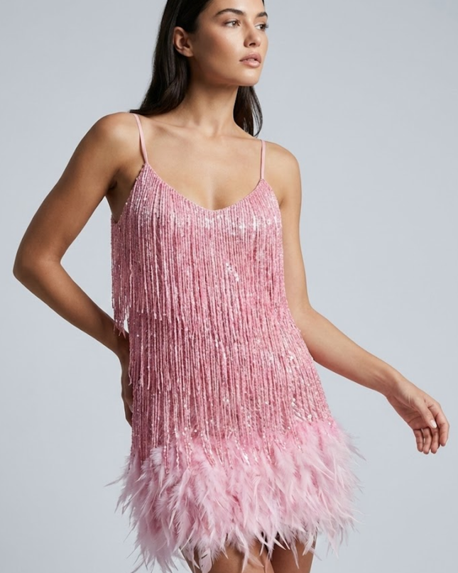 Woman wearing sequin feather mini dress