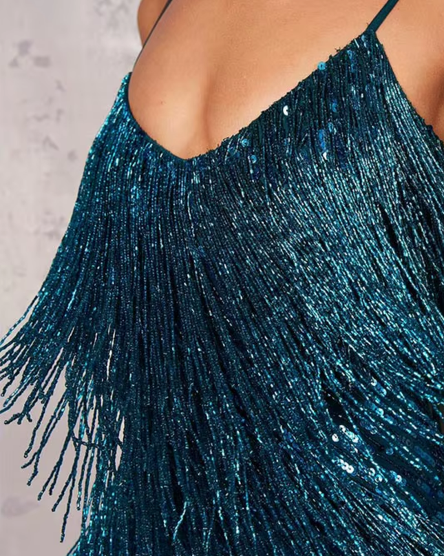 Woman wearing sequin feather mini dress