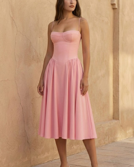 Woman wearing sage green midi dress