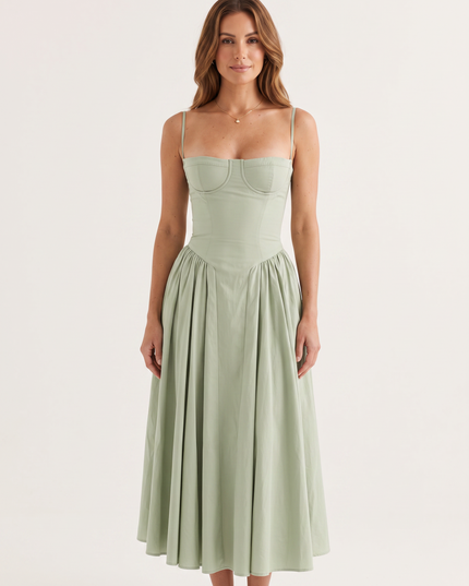 Woman wearing sage green midi dress
