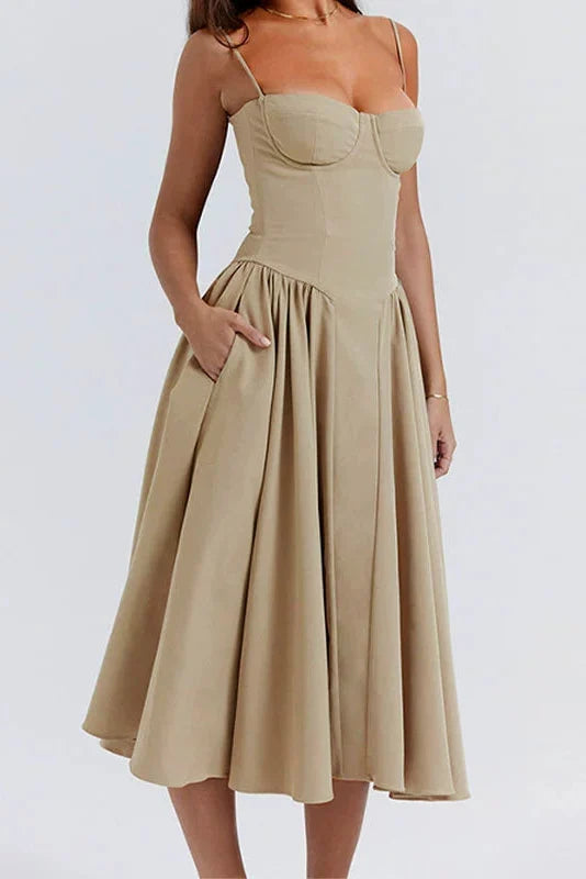 Woman wearing sage green midi dress