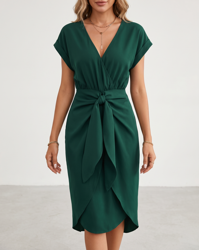 Woman wearing midi wrap dress with tie waist