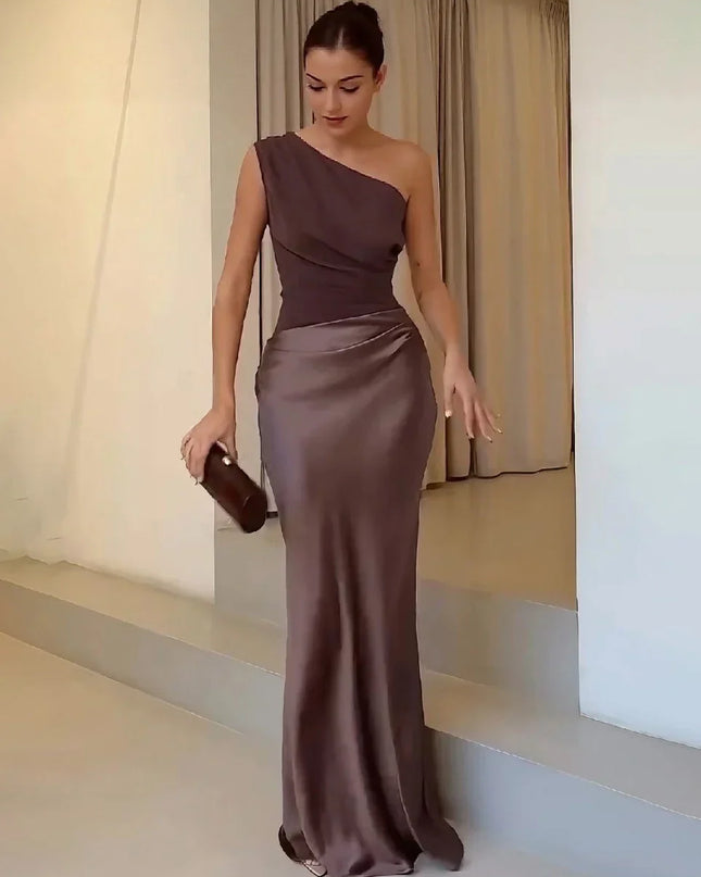 Woman wearing one-shoulder satin evening dress