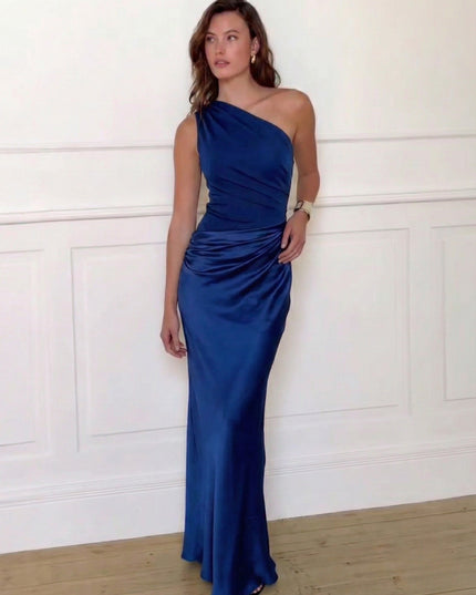 Woman wearing one-shoulder satin evening dress