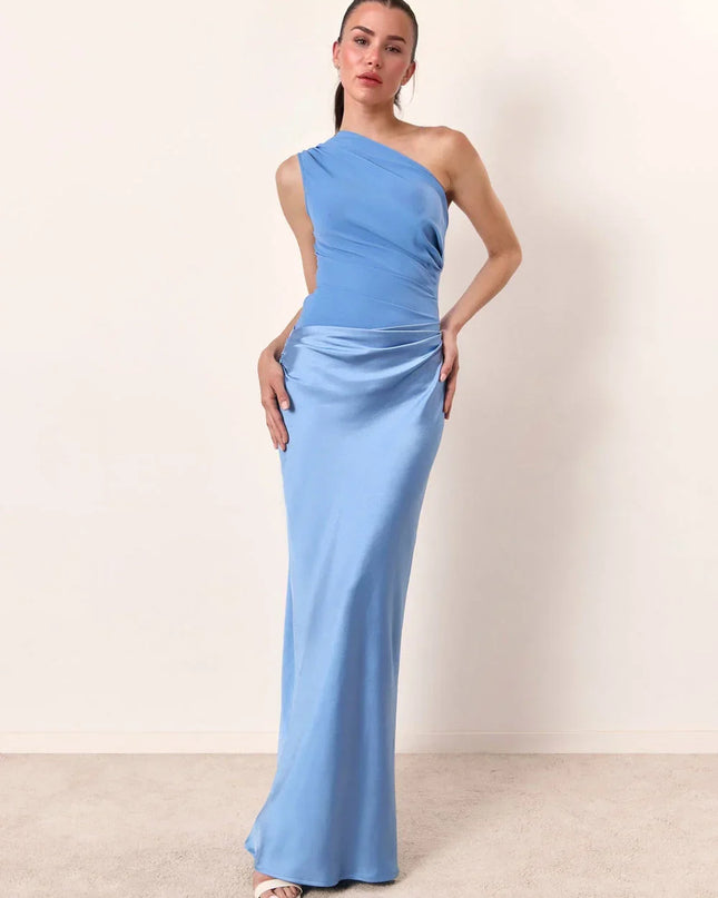 Woman wearing one-shoulder satin evening dress