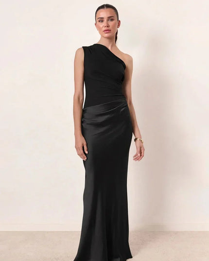 Woman wearing one-shoulder satin evening dress