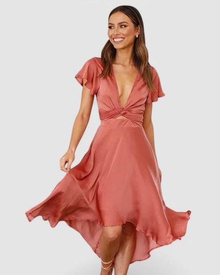 Woman wearing flowing wrap midi dress