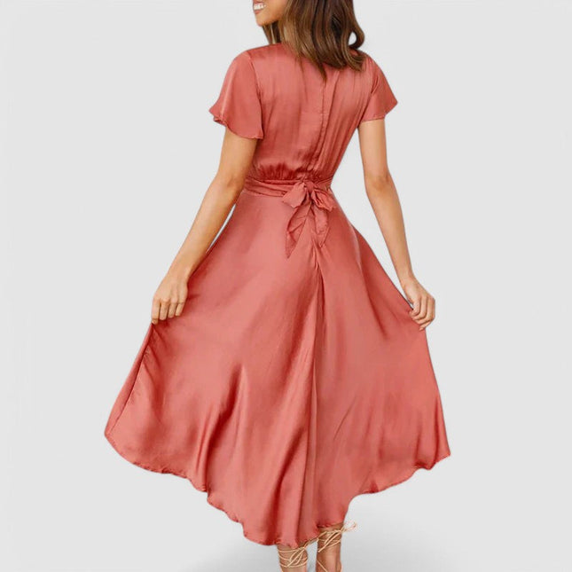 Woman wearing flowing wrap midi dress