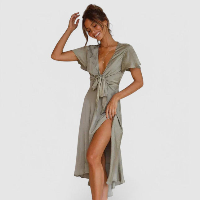 Woman wearing flowing wrap midi dress